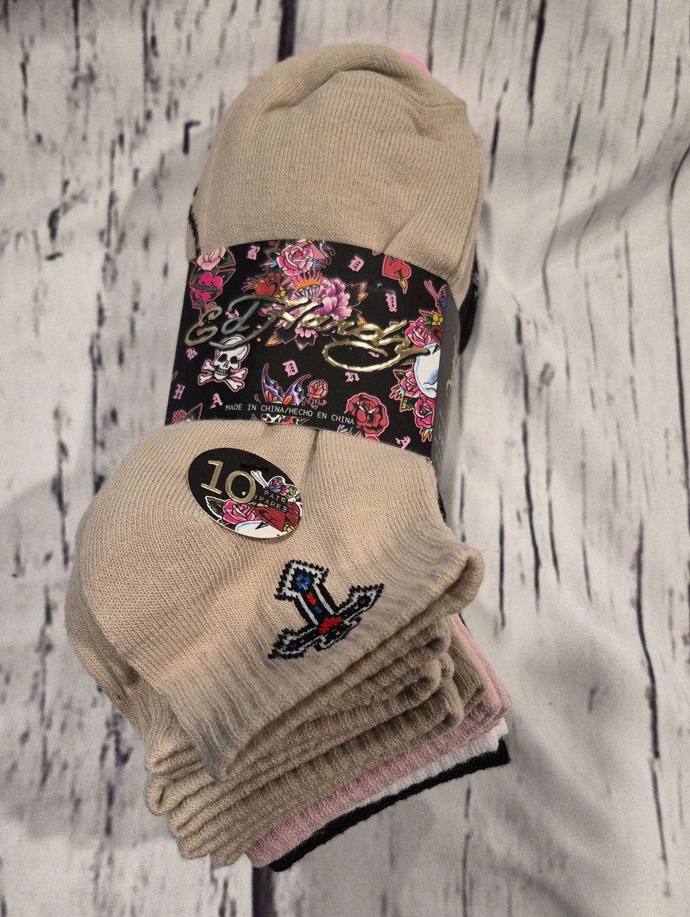 New Ed Hardy 10-pair quarter sock set for women.Includes a mix of colors.